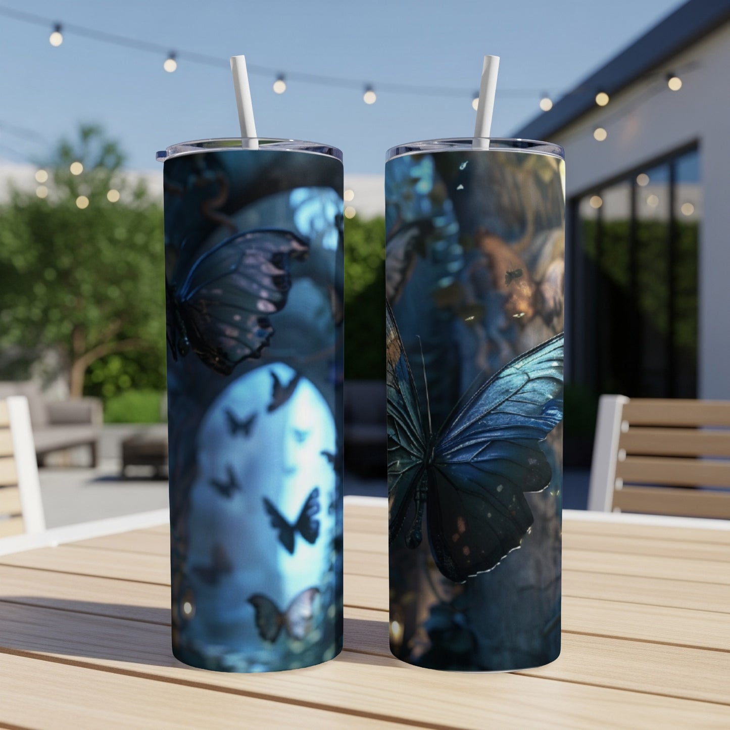 Two tumblers featuring blue butterflies and dark, mystical backgrounds.