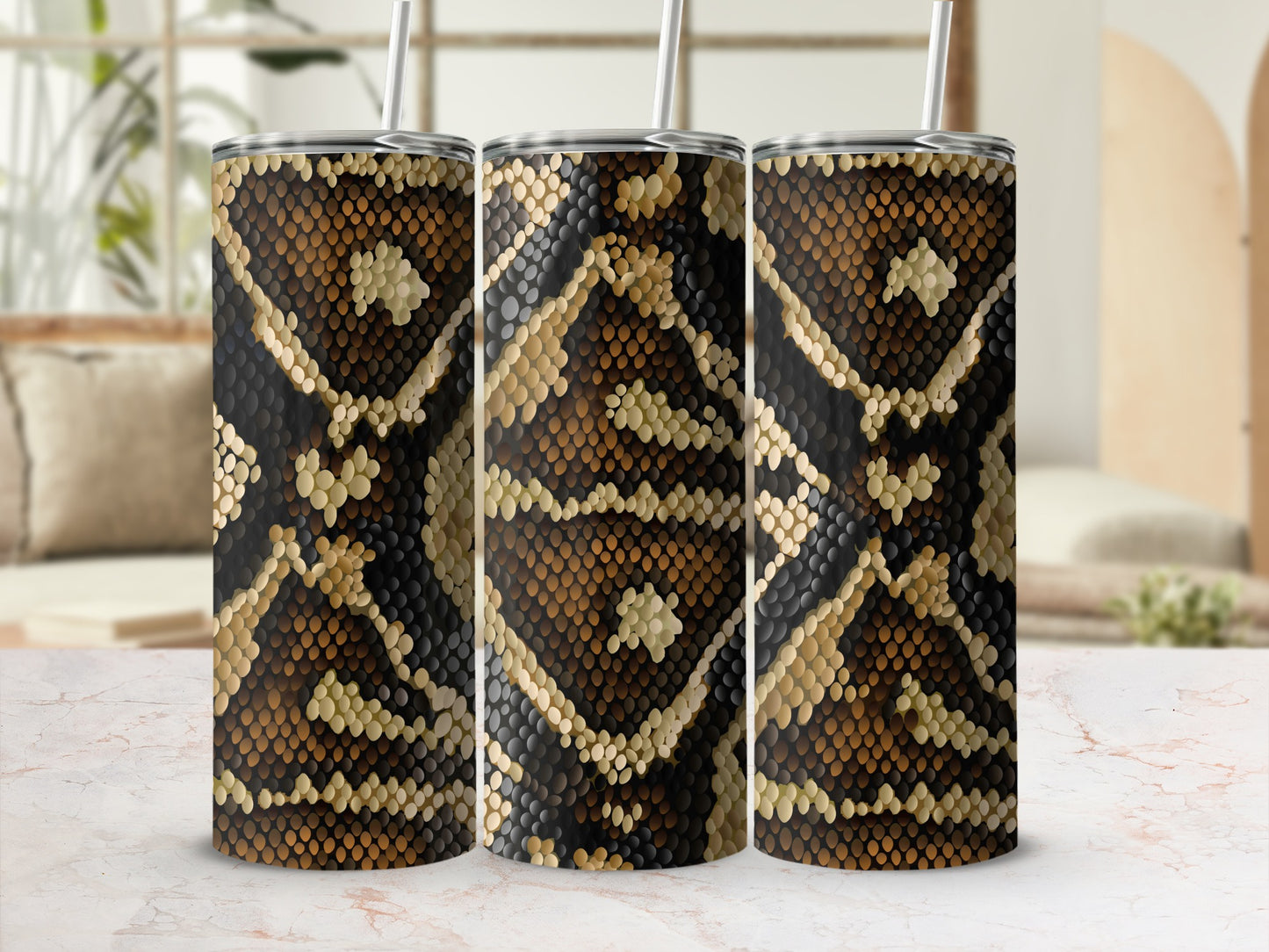 Three tumblers with a brown and black snakeskin pattern, each with a straw.