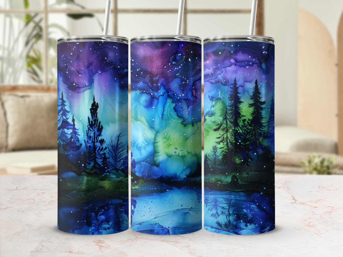 Three tumblers with a dark forest and starry night sky design.