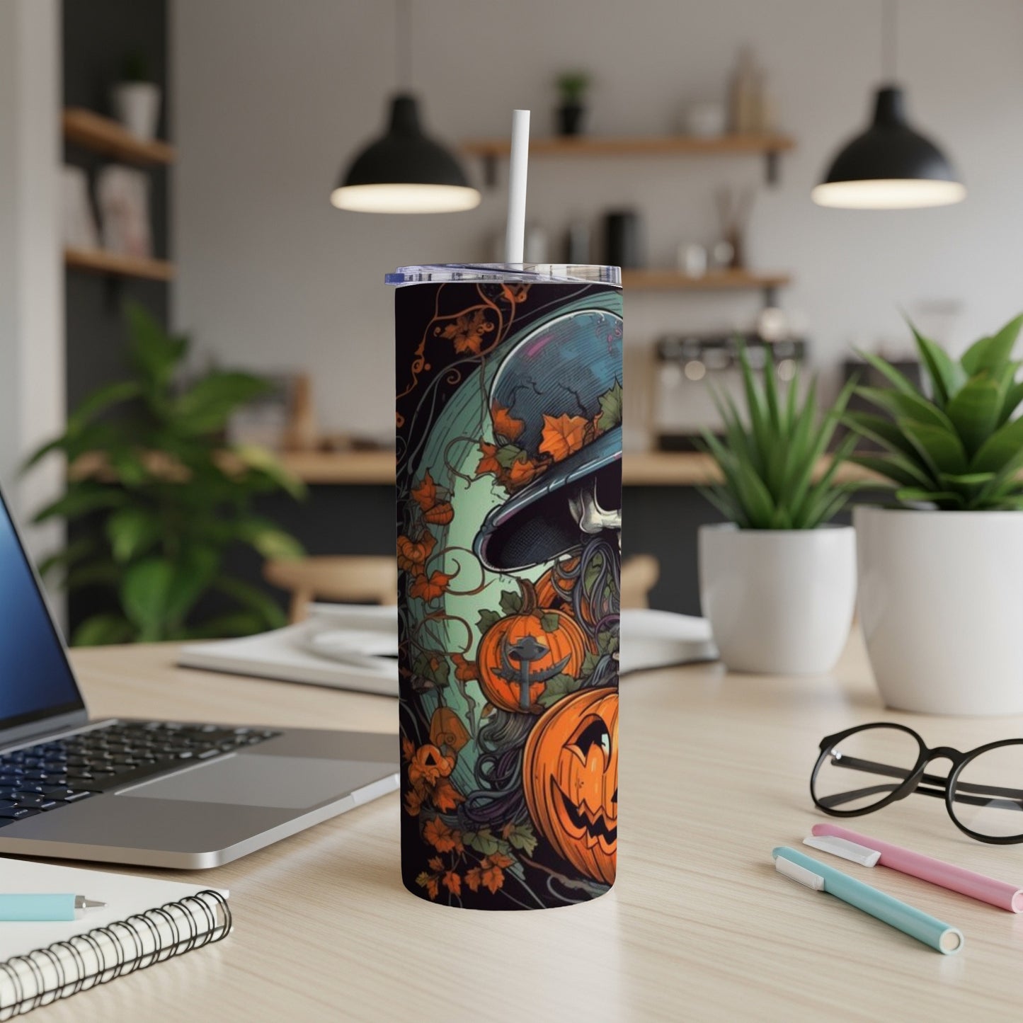 Halloween tumbler with skeleton, pumpkins, and autumn leaves design