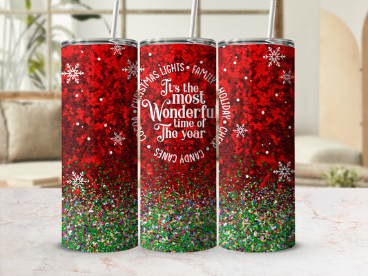 Red glitter tumbler with white snowflakes and "It's the most wonderful time of the year" text.