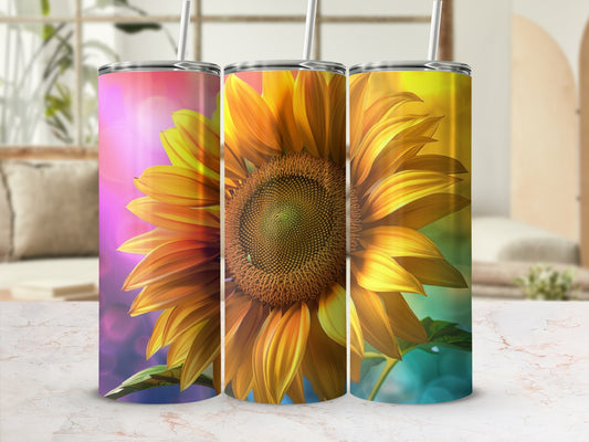 Three tumblers featuring a large sunflower against a colorful, blurred background.