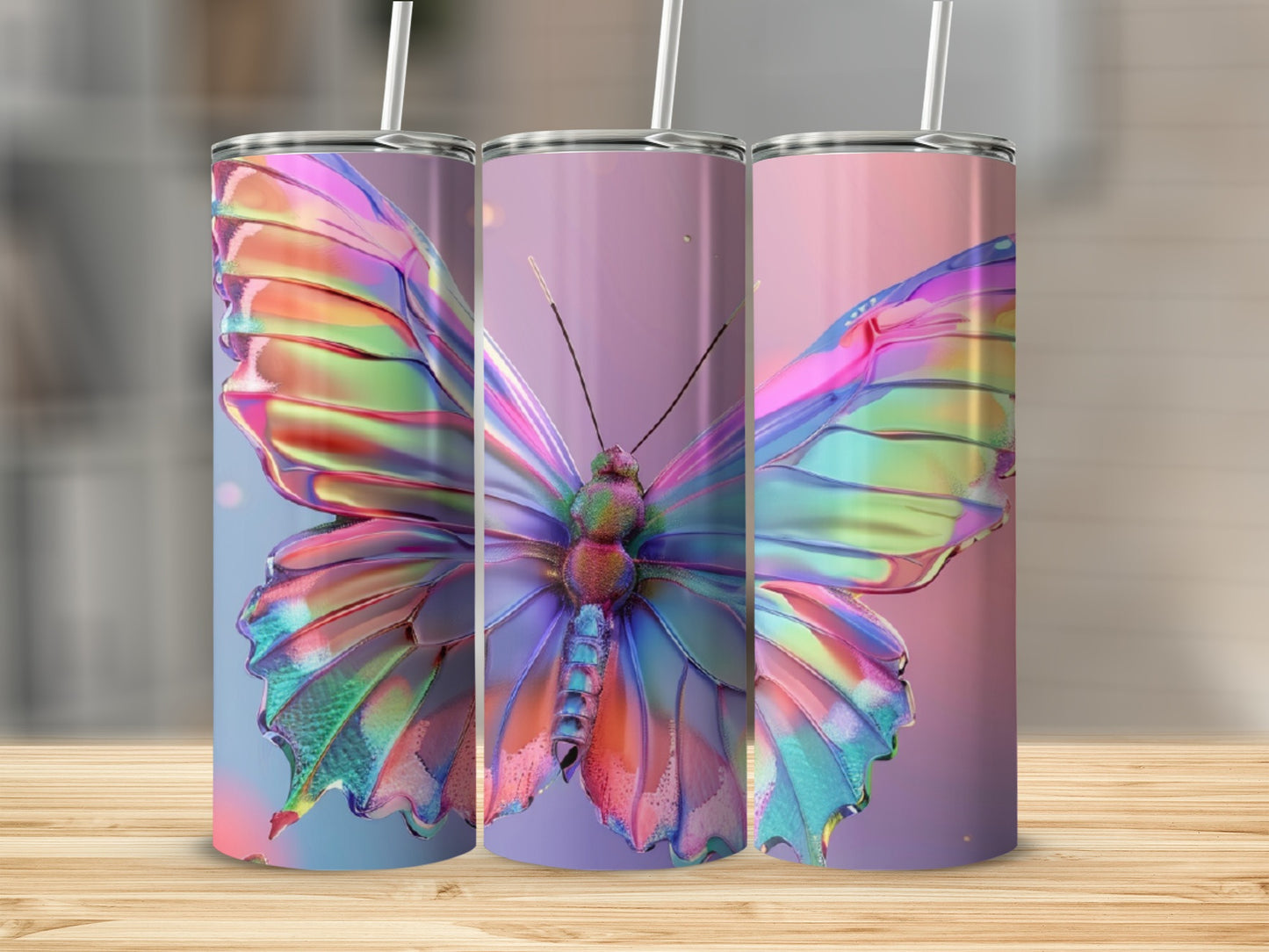 Iridescent butterfly design on three 20 oz sublimation tumblers.