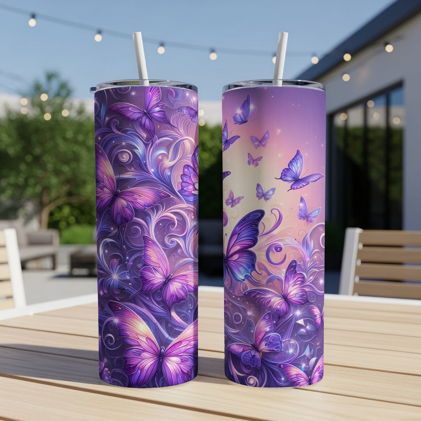 Two tumblers with iridescent purple butterflies and swirling floral patterns.