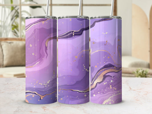 Purple and gold marbled tumbler with straw, displayed on a countertop.