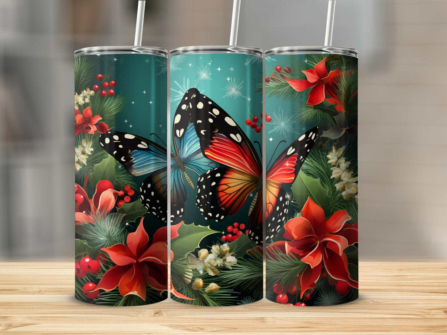 Three tumblers with butterflies and poinsettias on a green background.