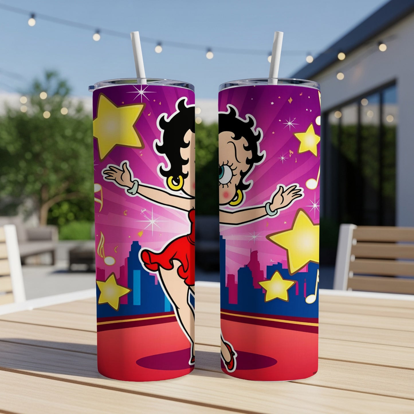 Betty Boop tumbler with stars and city skyline design.