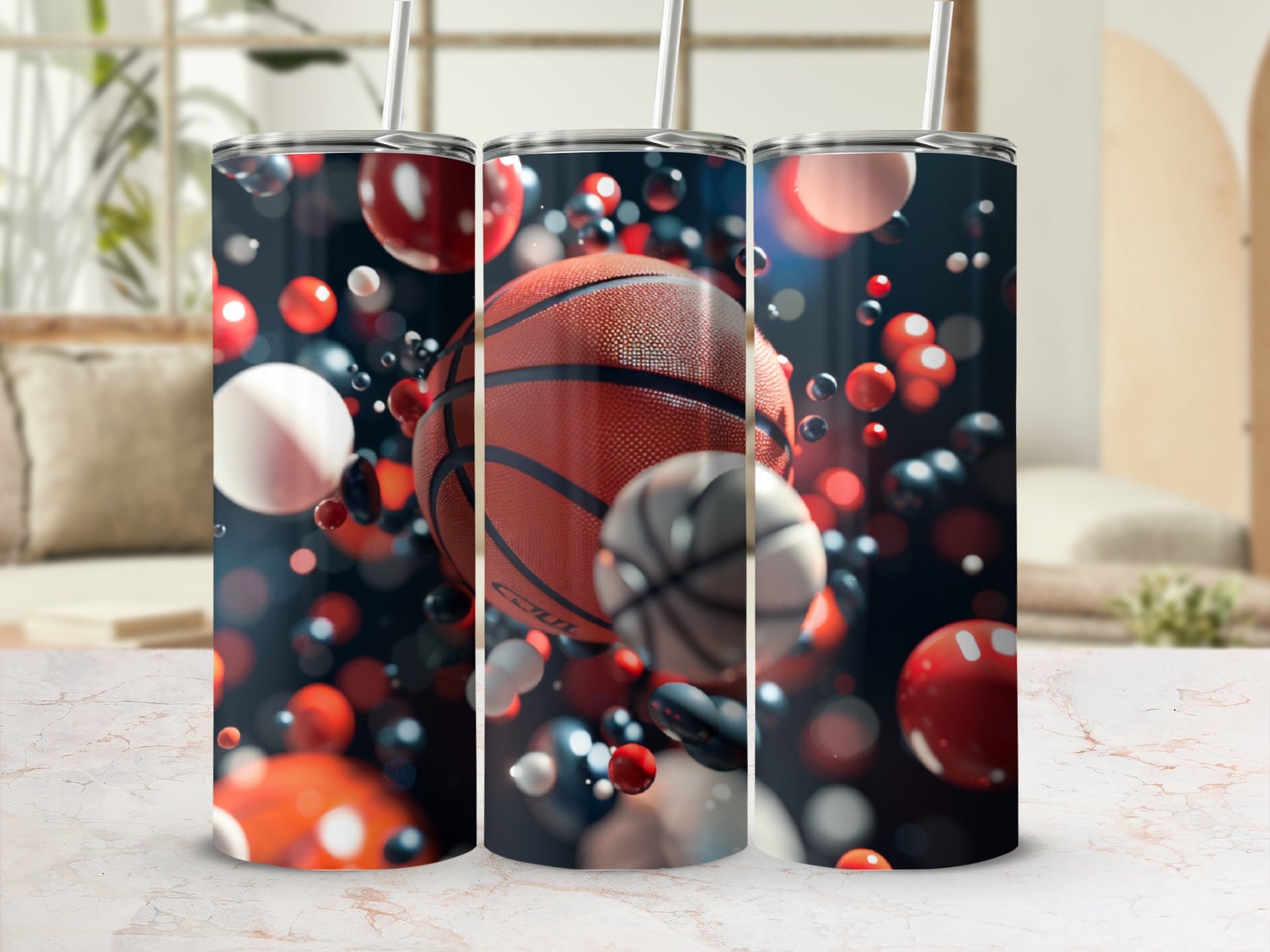 Three tumblers with basketballs and abstract bubbles on a marble surface.