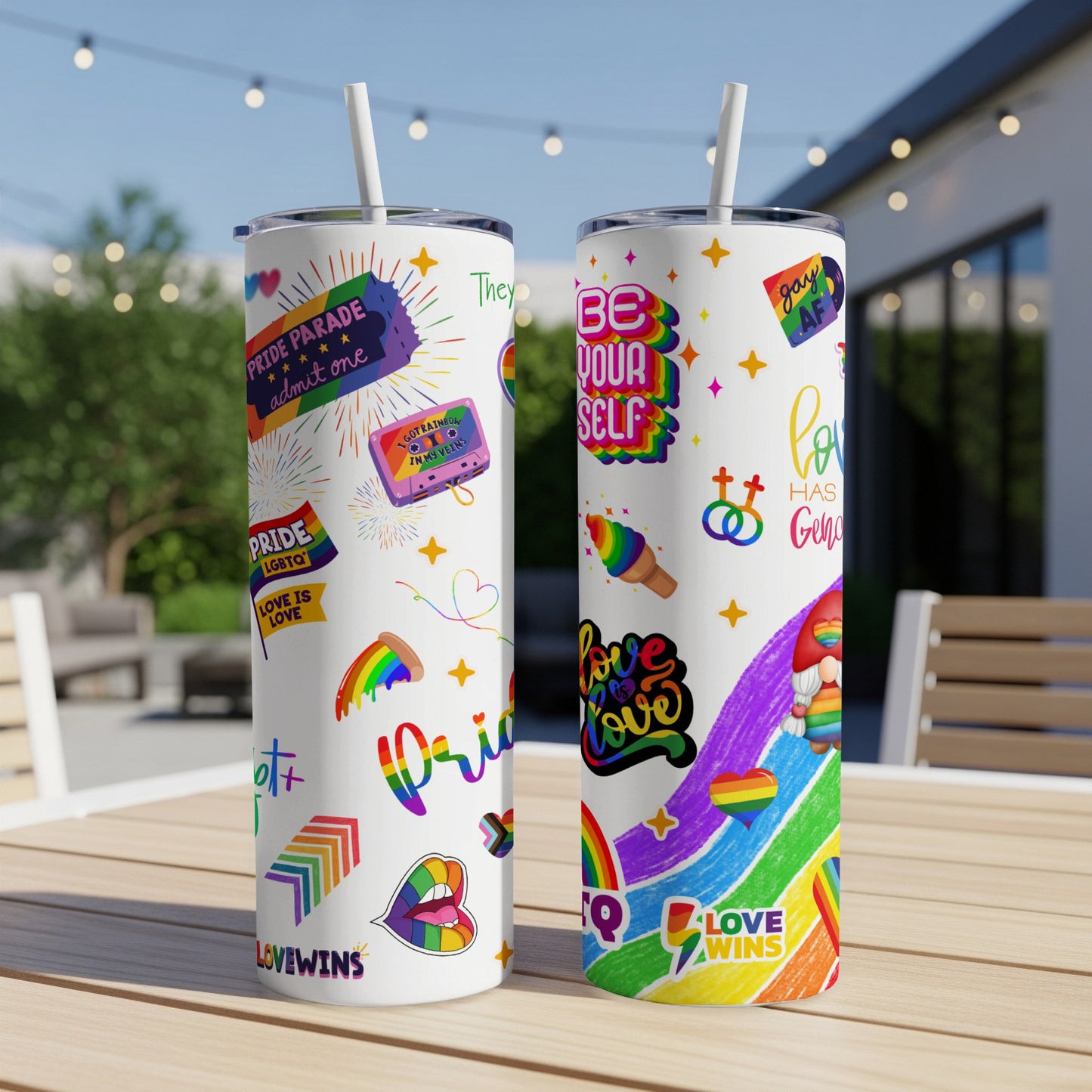 Two tumblers decorated with LGBTQ+ pride symbols and text.