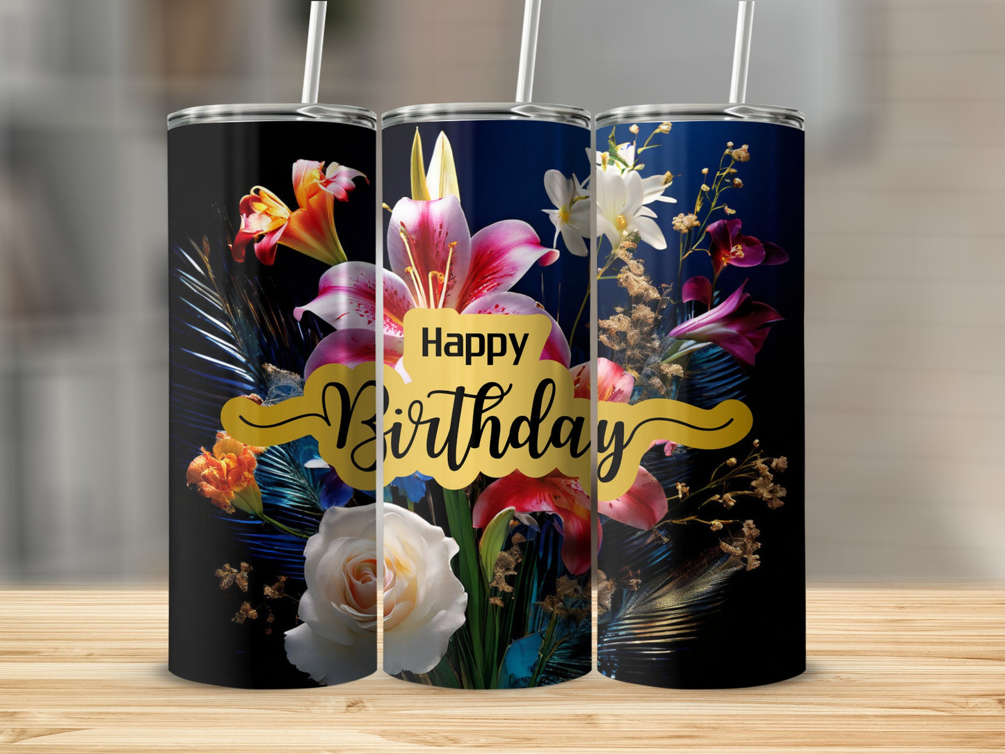 Three tumblers with a floral design and "Happy Birthday" text.