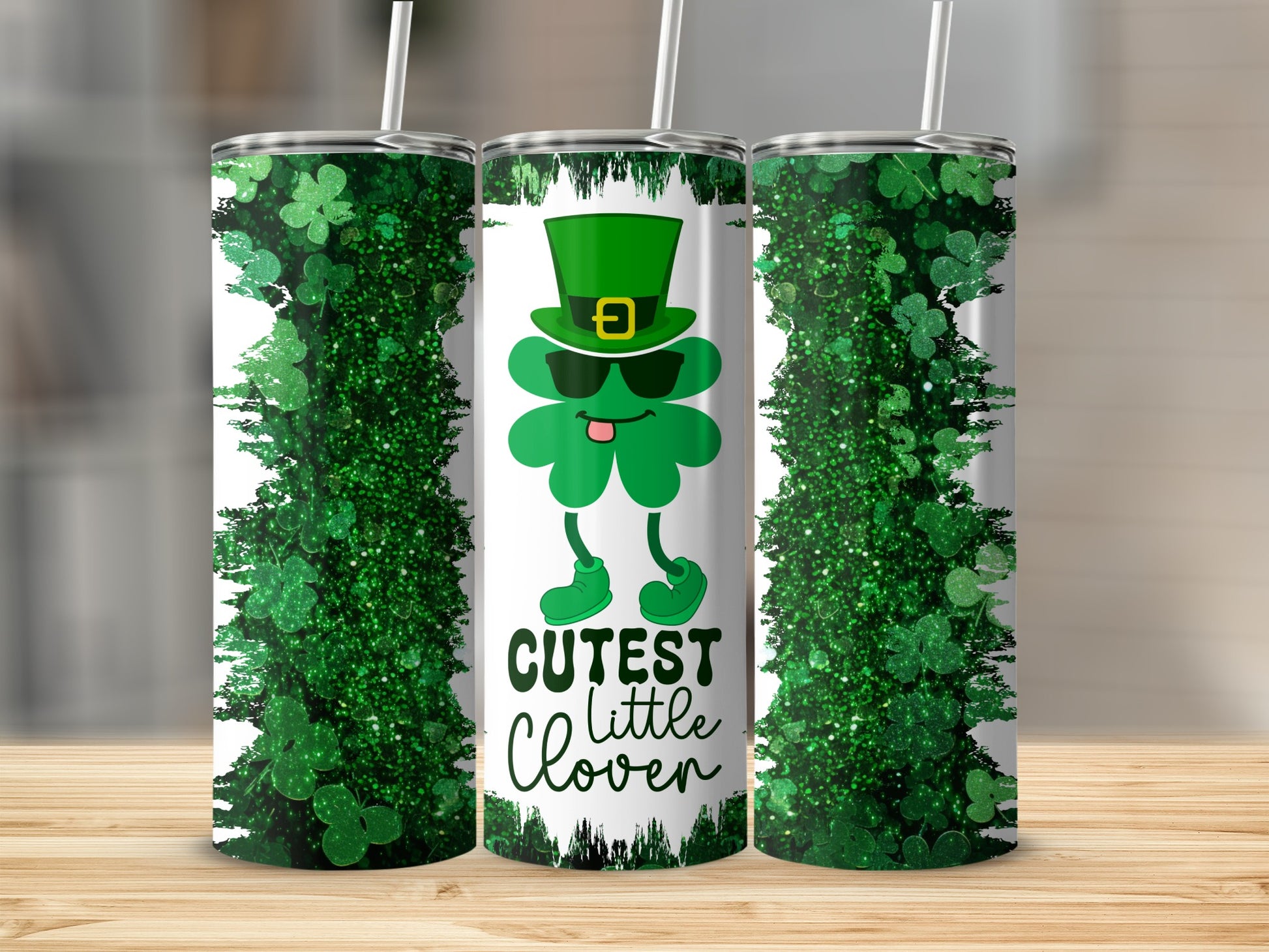 Green shamrock with hat and sunglasses, "Cutest Little Clover" text.