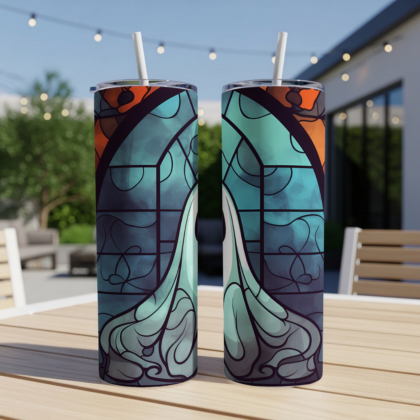 Two stained-glass style tumblers with abstract blue and orange designs.
