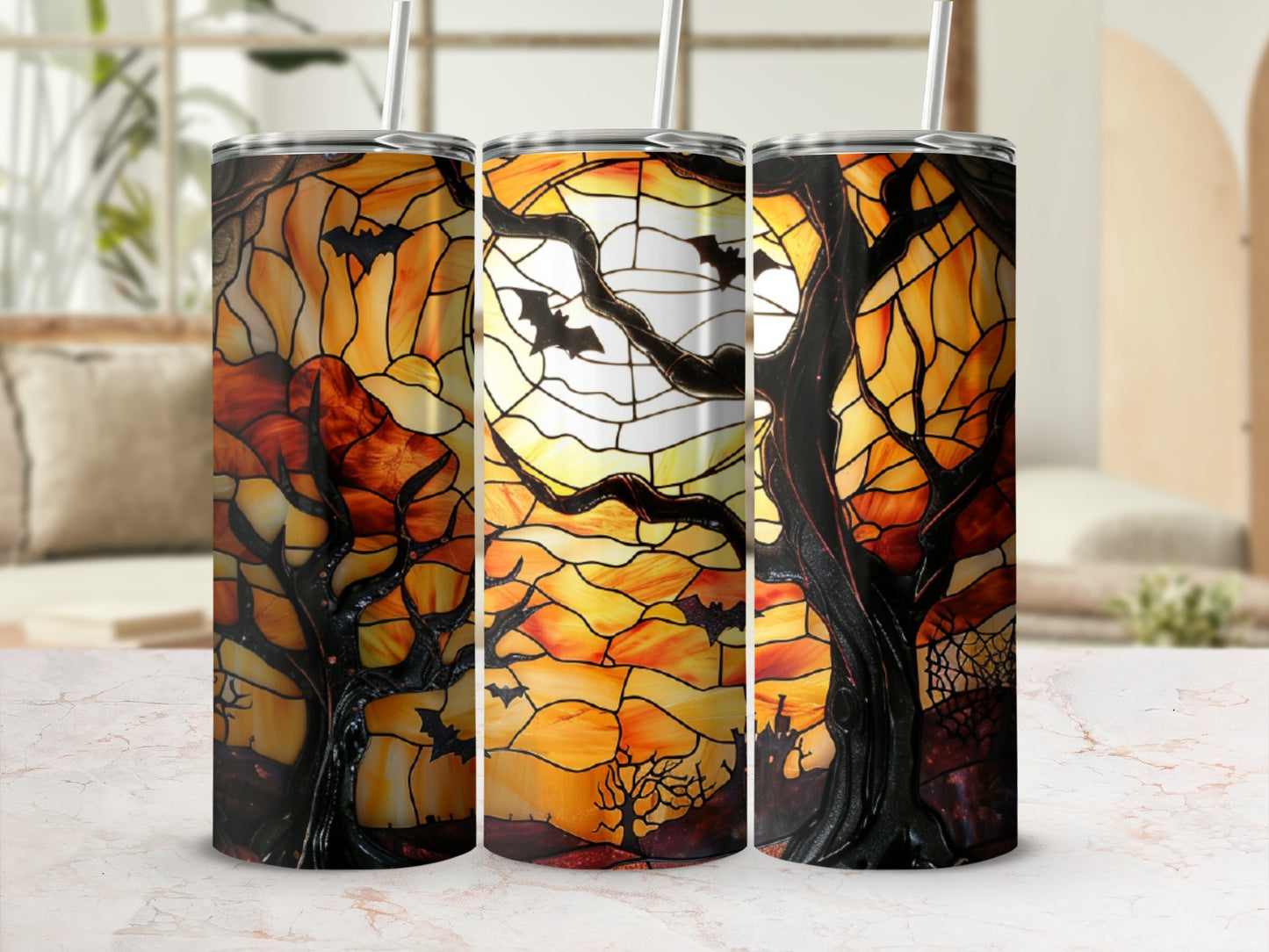 Stained glass tumbler with Halloween tree, bats, moon, and haunted house design.