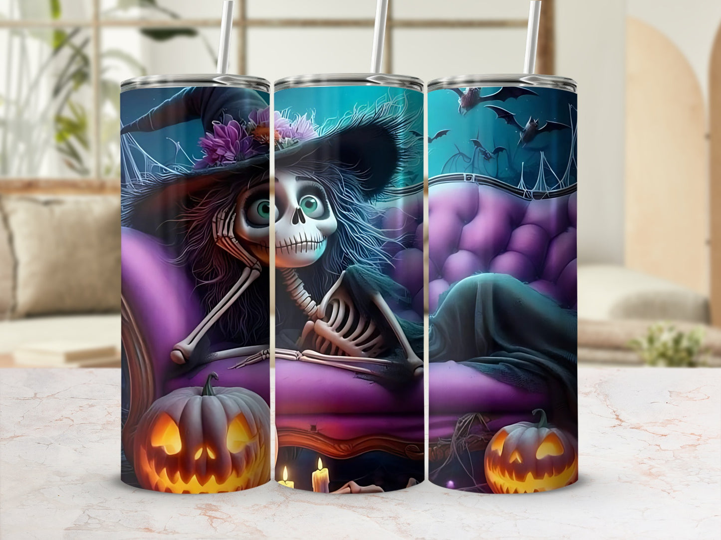 Three tumblers with Halloween skeleton witch and pumpkin designs.