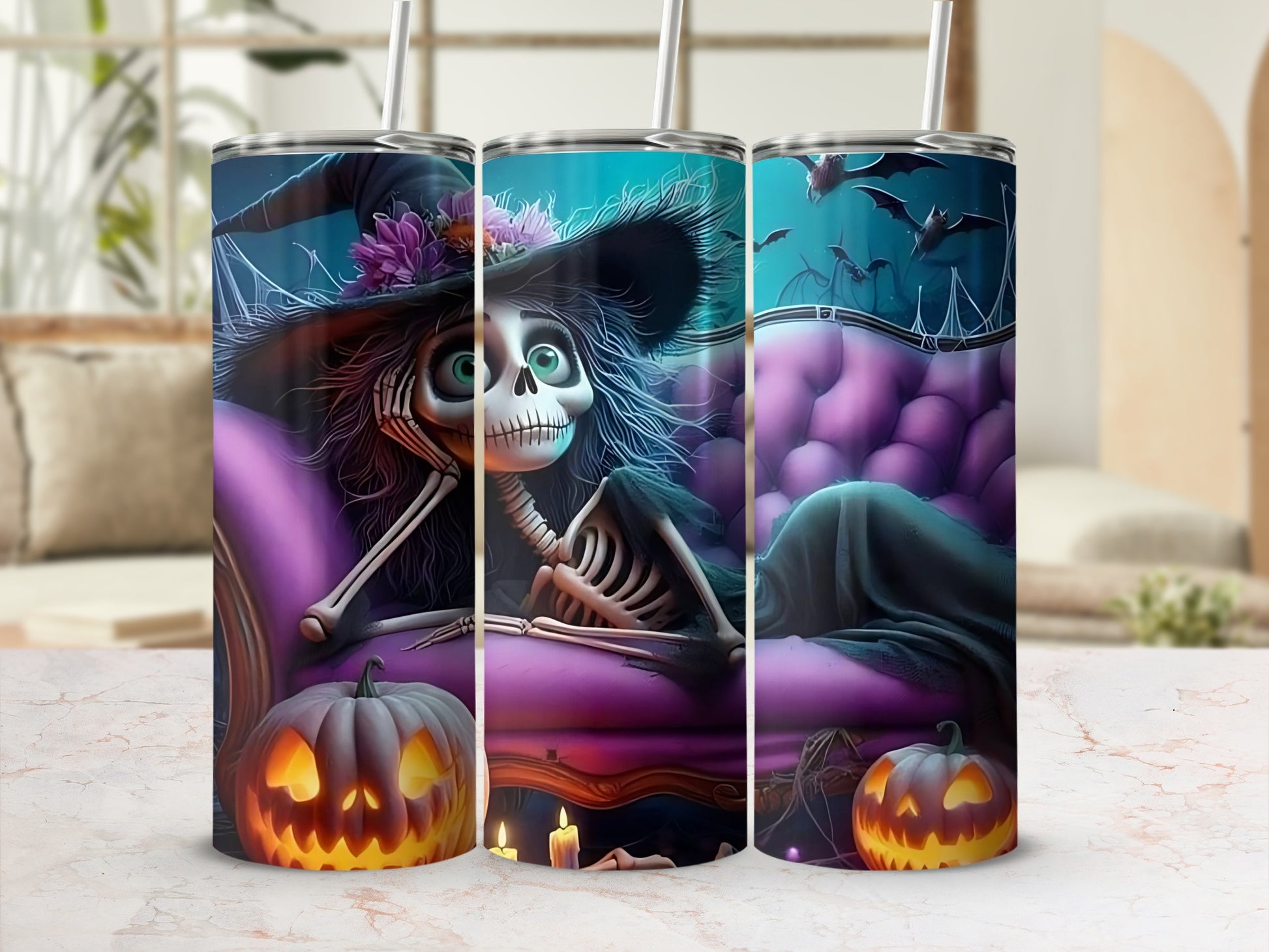 Three tumblers with Halloween skeleton witch and pumpkin designs.