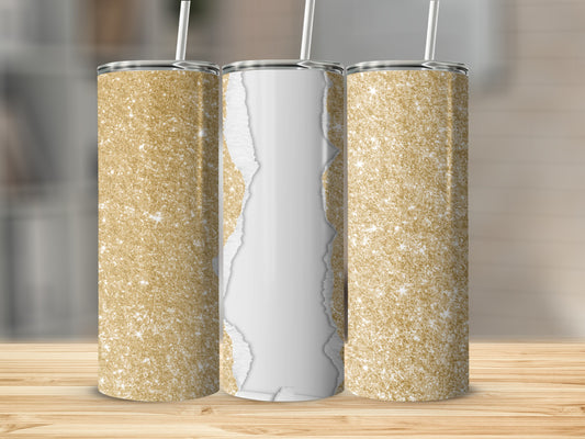 Three glitter tumblers with torn paper design on a wooden surface.