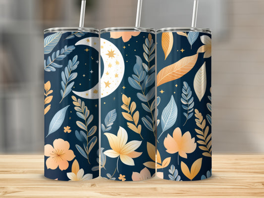 Three tumblers with a celestial floral pattern on a wooden surface.