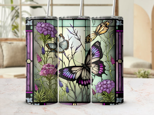 Tall tumbler with stained glass-style butterflies and purple flowers.