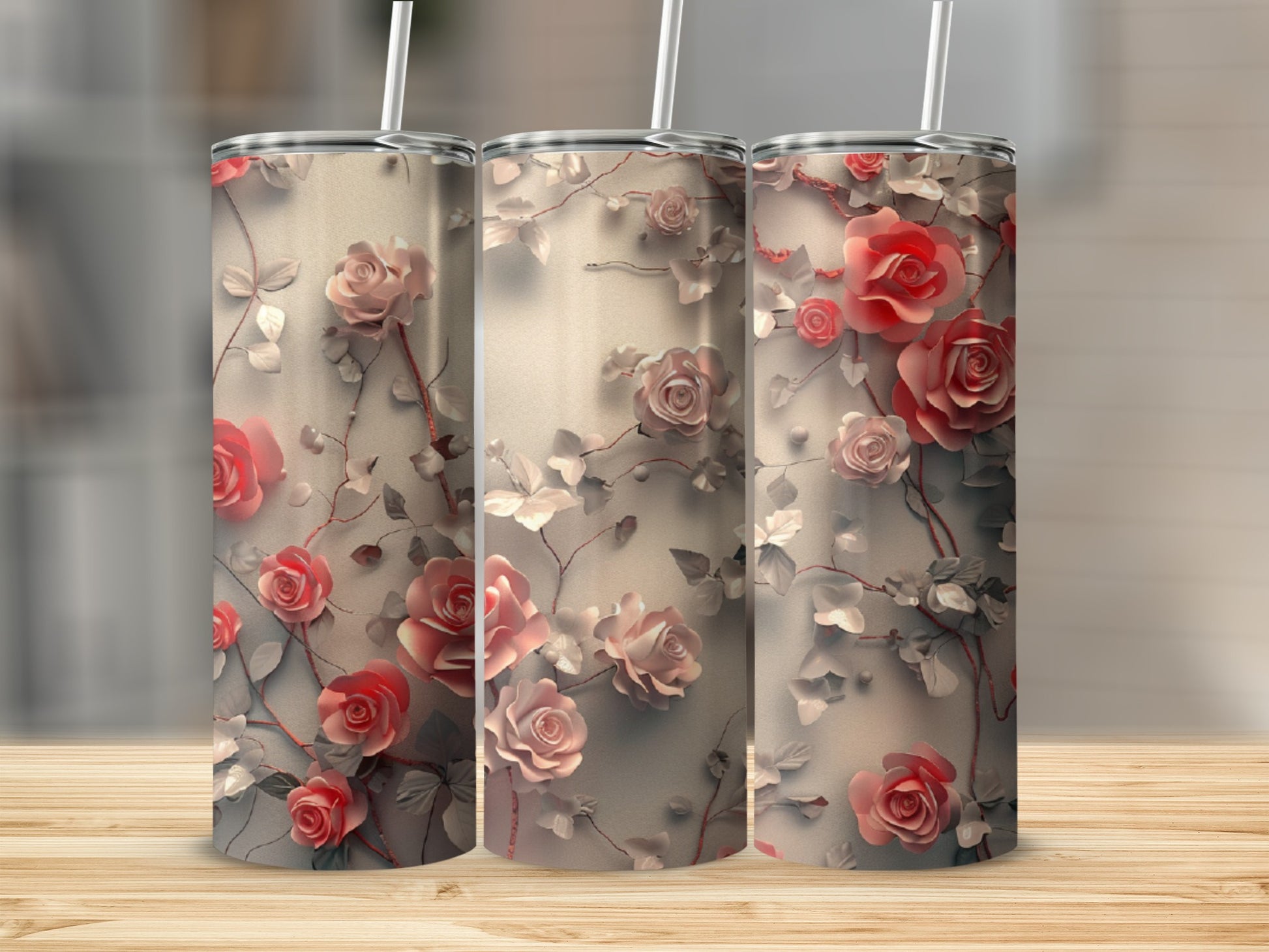 Three tumblers with a pale pink rose and vine design.