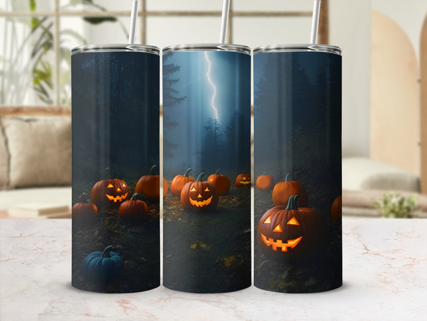 Three tumblers featuring glowing jack-o'-lanterns and a spooky forest lightning scene.