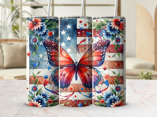 Patriotic butterfly on US flag tumbler with floral accents.