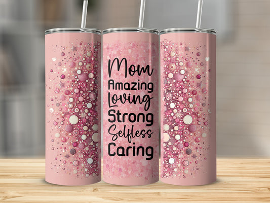 Pink tumbler with "Mom Amazing Loving Strong Selfless Caring" text and sparkly design.
