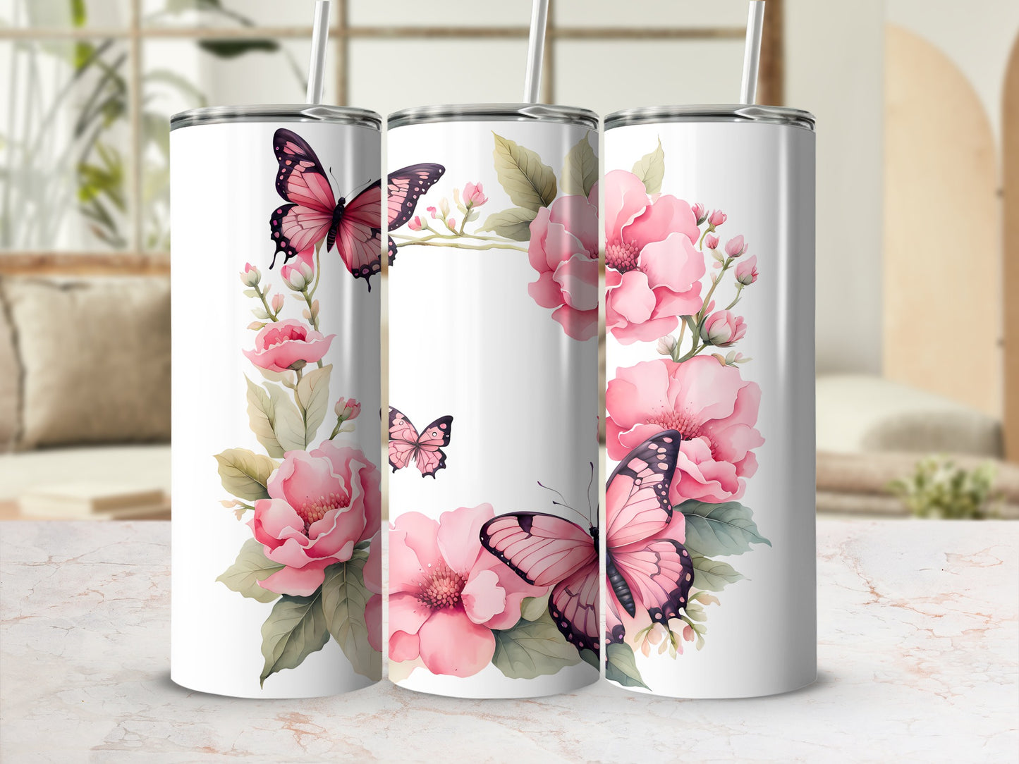 White tumblers with pink floral wreath and butterflies design.