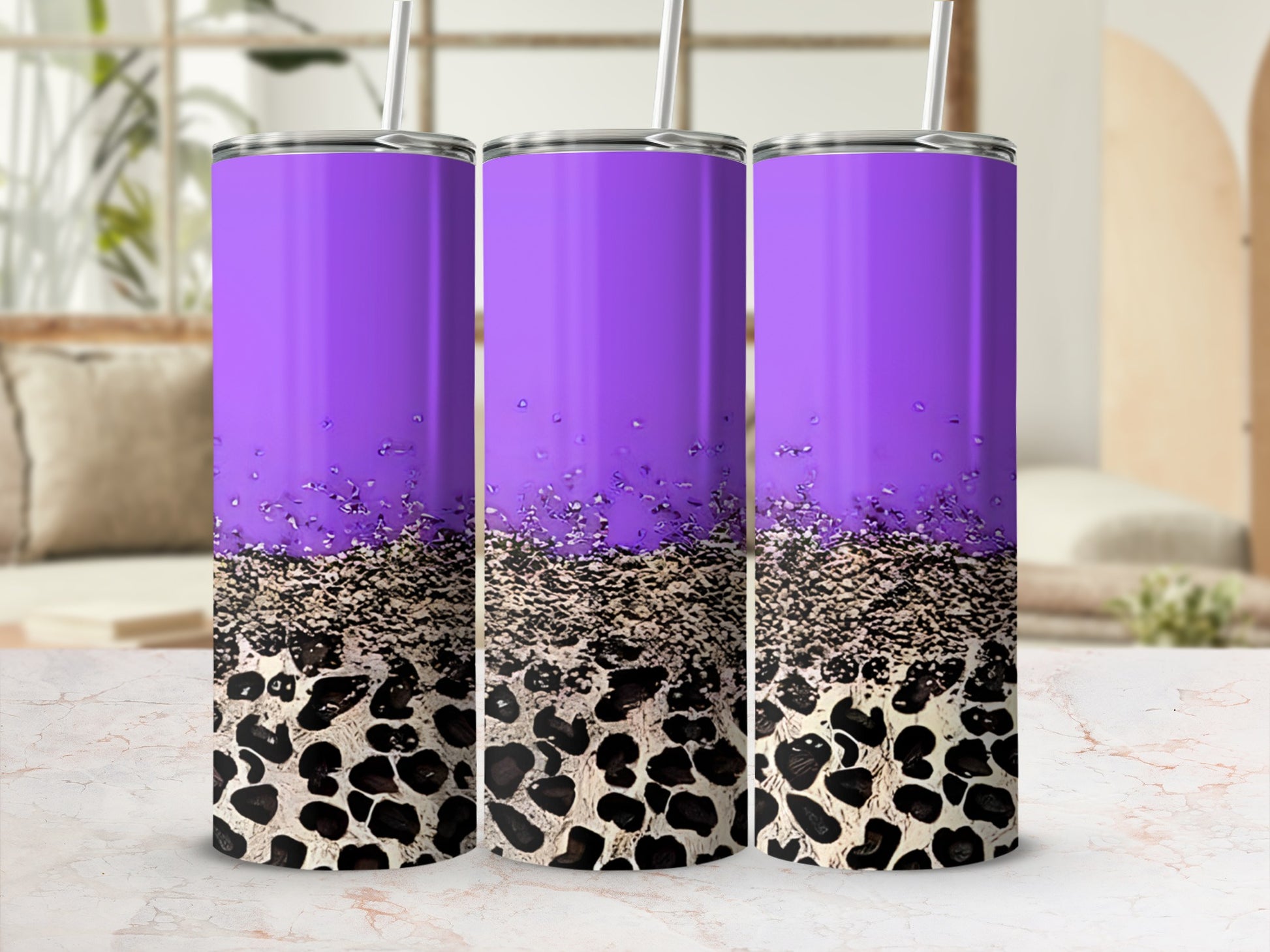 Purple tumbler with leopard print gradient and straw.