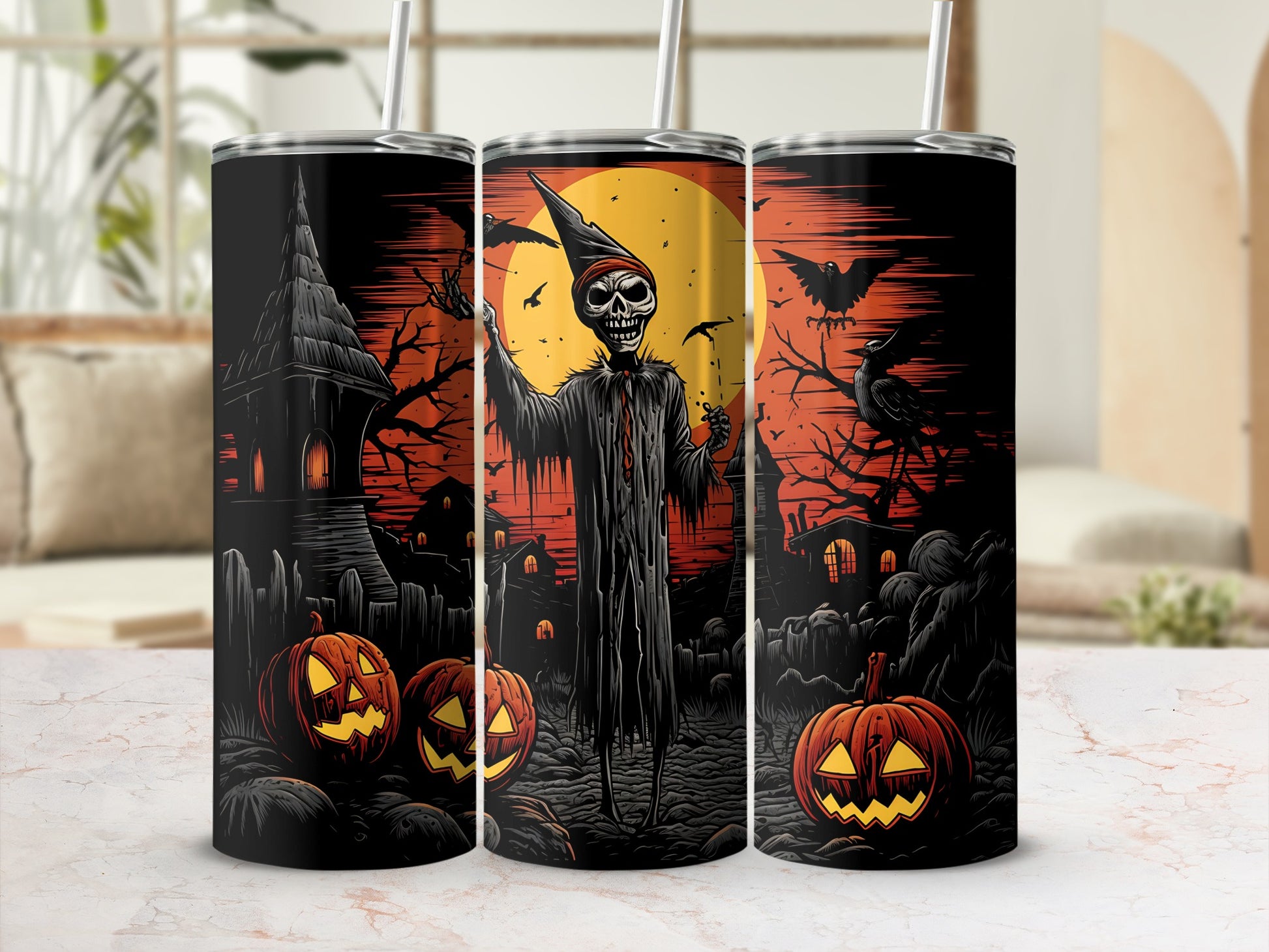 Three tumblers with a Halloween scene featuring a skeleton, spooky houses, and jack-o'-lanterns.
