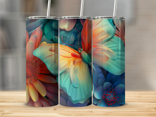 Three tumblers featuring colorful floral and butterfly designs on a wooden surface.