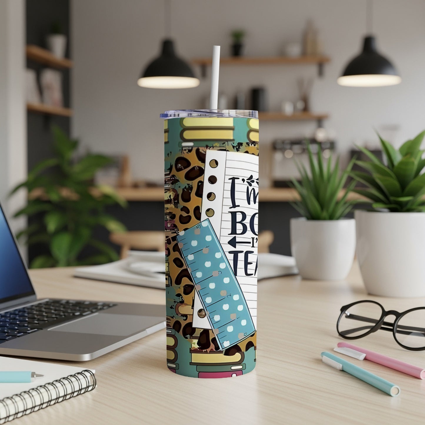 Tall tumbler with books, leopard print, and "I'm so busy reading" text.