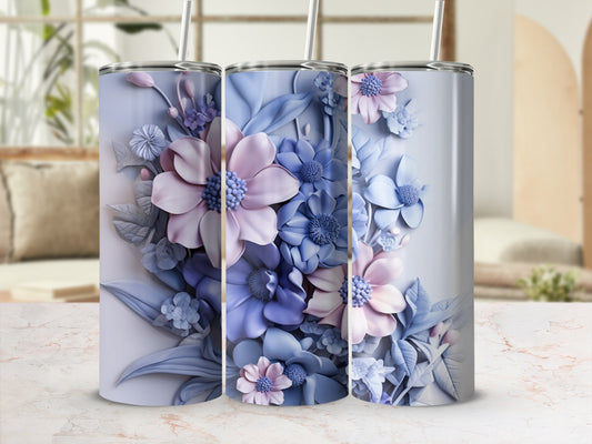 Three tall tumblers adorned with pastel floral designs.