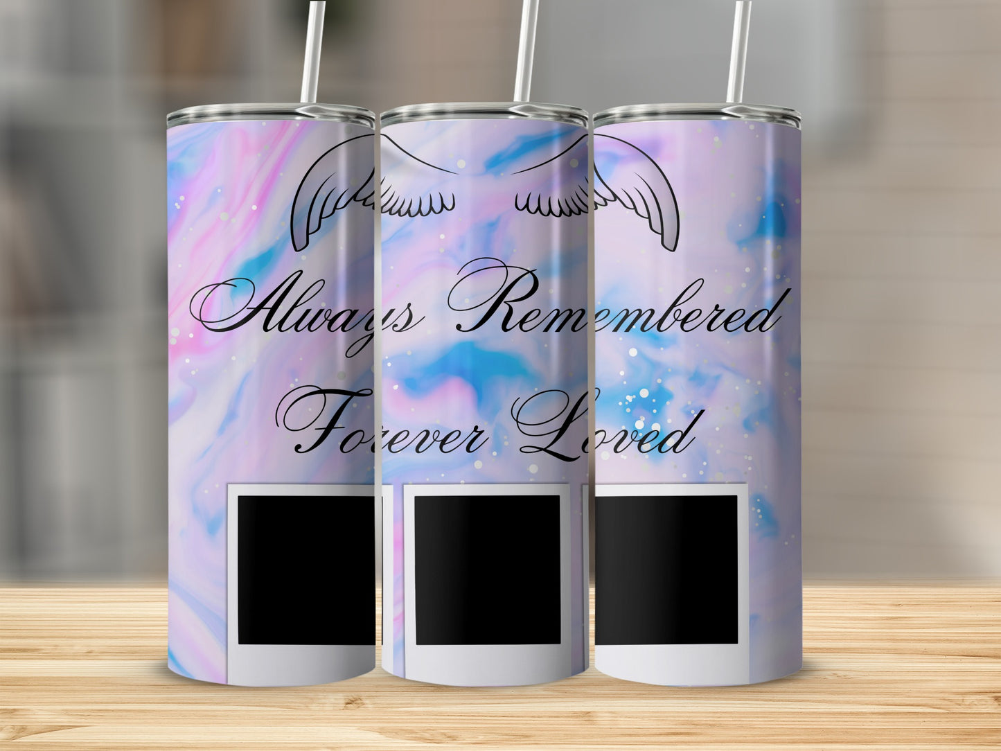 Tumblers with angel wings, "Always Remembered Forever Loved" text, and photo frames.