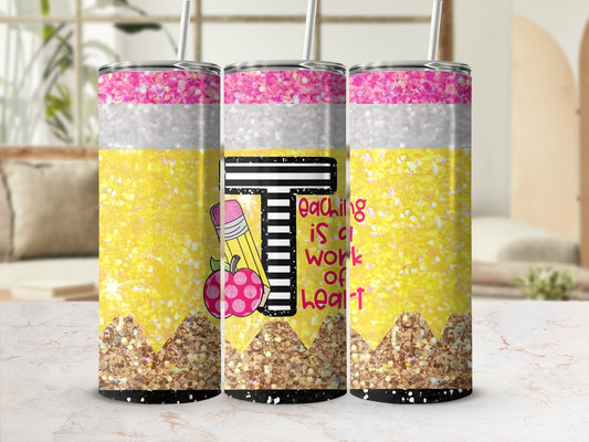 Glitter pencil tumbler with text "Teaching is a work of heart".