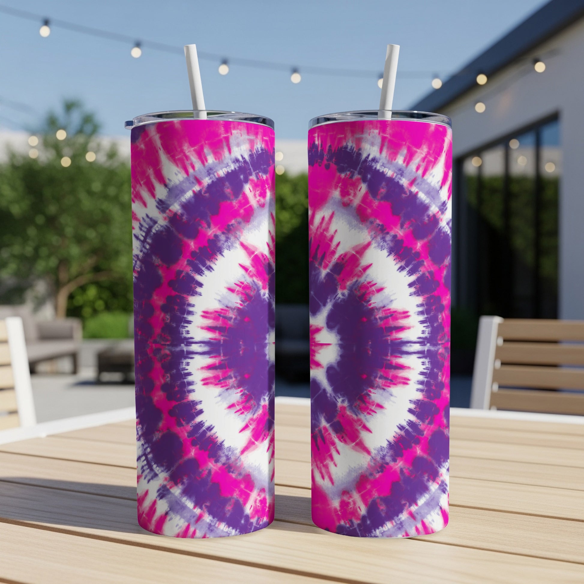 Two tall tumblers with pink and purple tie-dye pattern, each with a white straw.