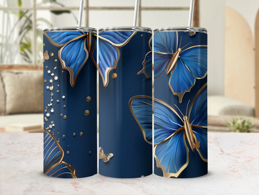 Three navy tumblers with gold butterfly and glitter designs.