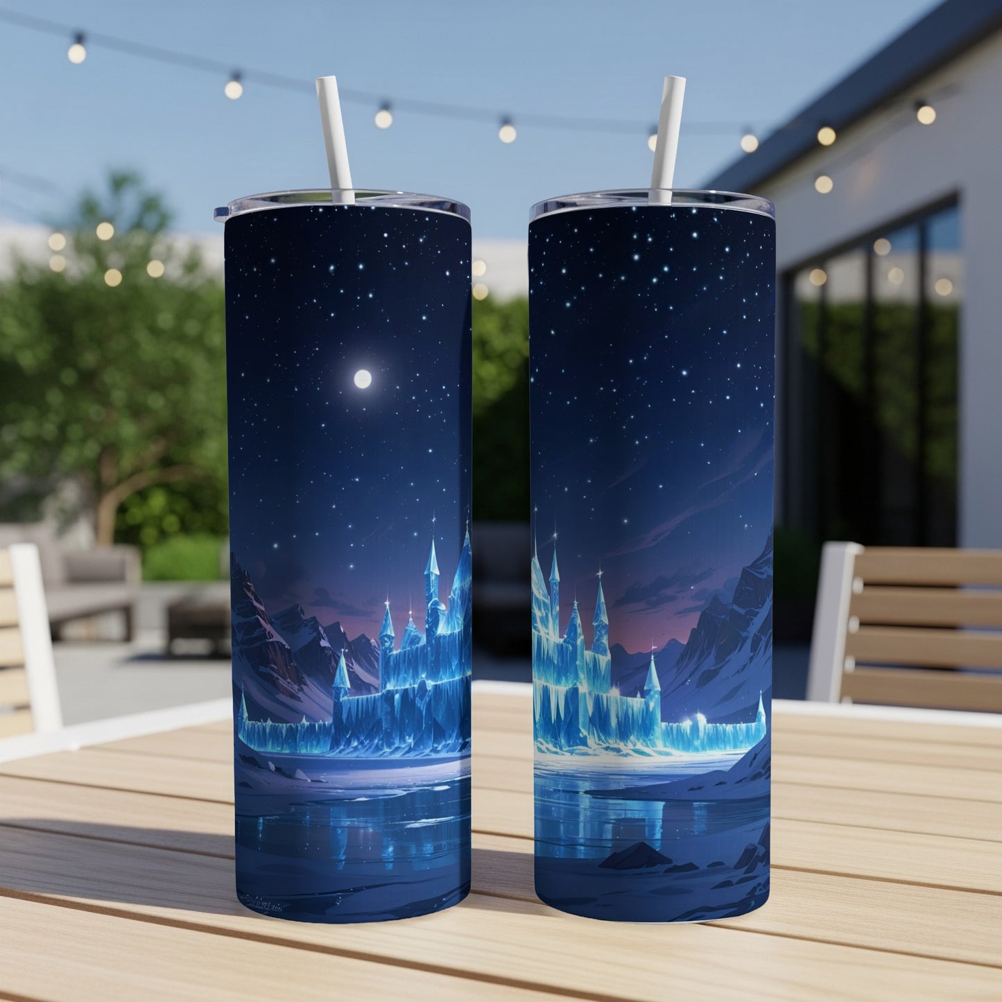 Two tumblers featuring a glowing ice castle under a starry night sky.
