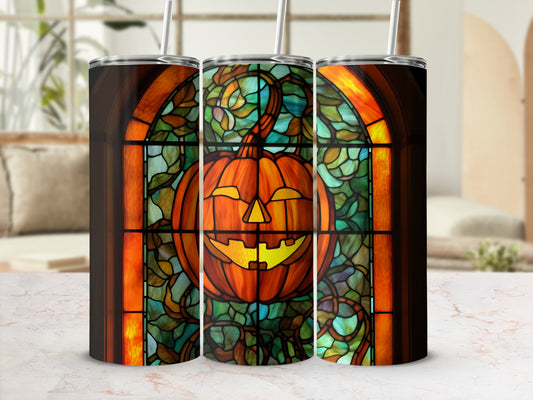 Pumpkin stained glass tumbler with straw.