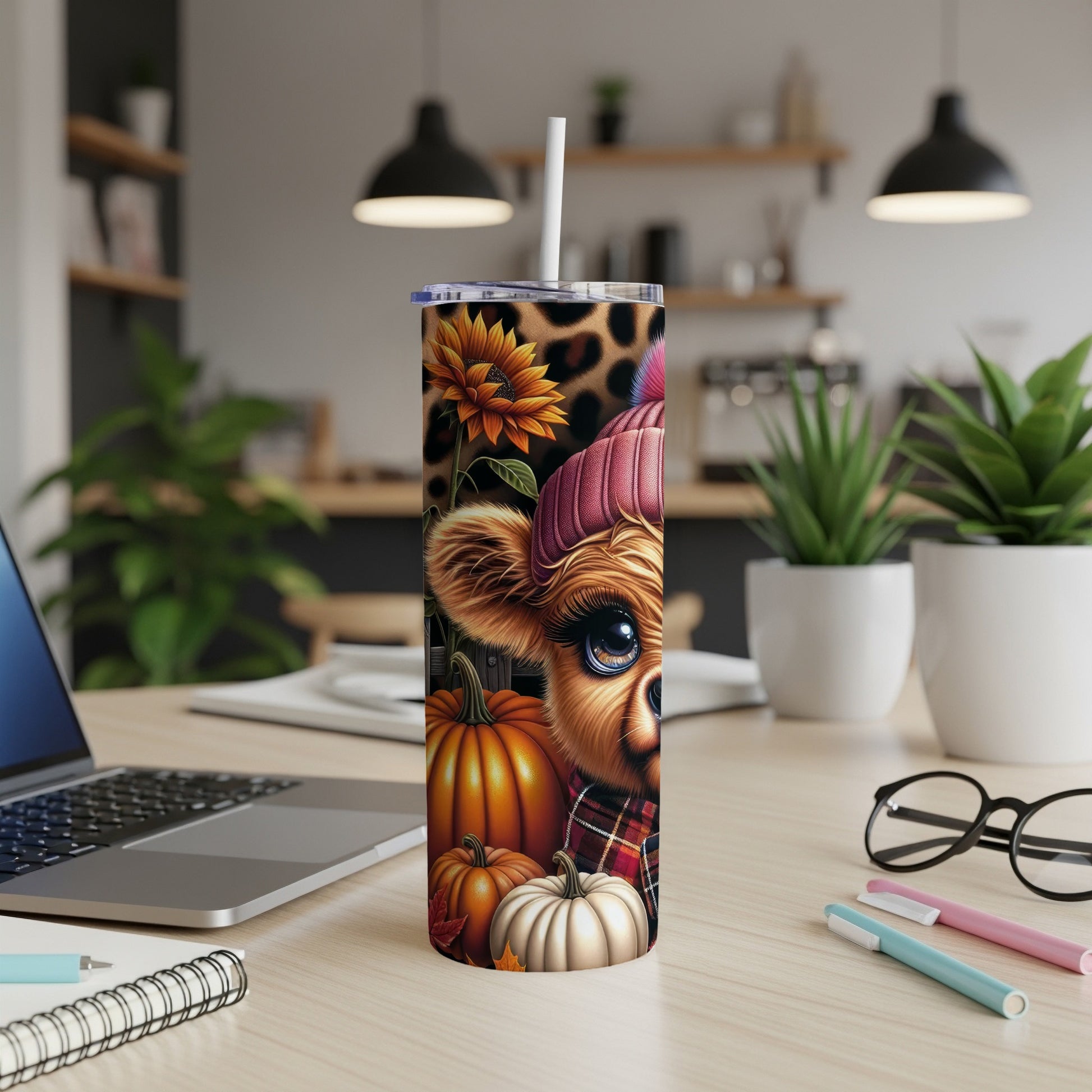 Cute cartoon cow with pumpkins and sunflowers on a tumbler.