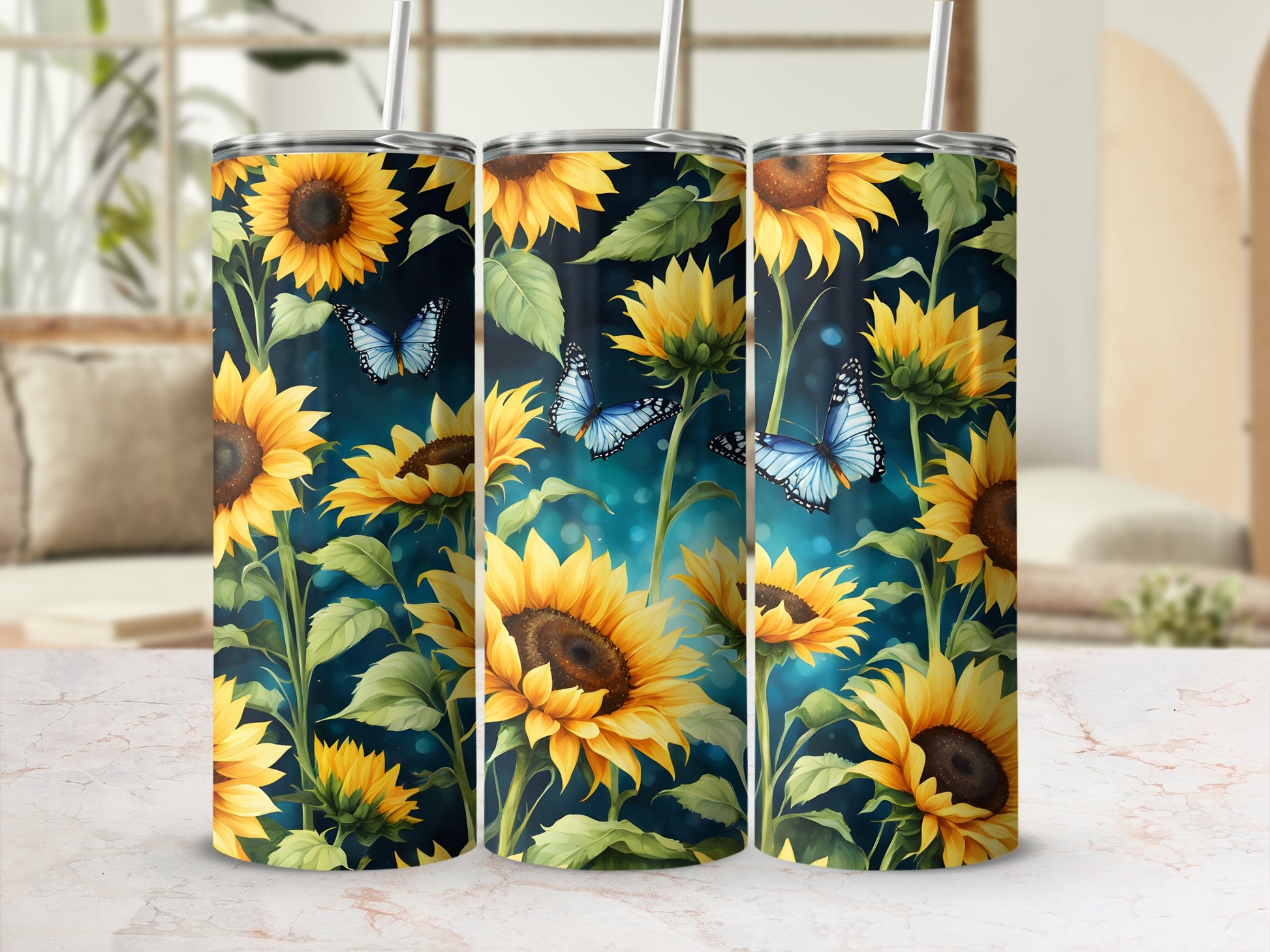 Three tumblers with sunflowers and blue butterflies design.