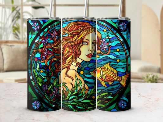 Stained glass tumbler with mermaid and golden fish design.