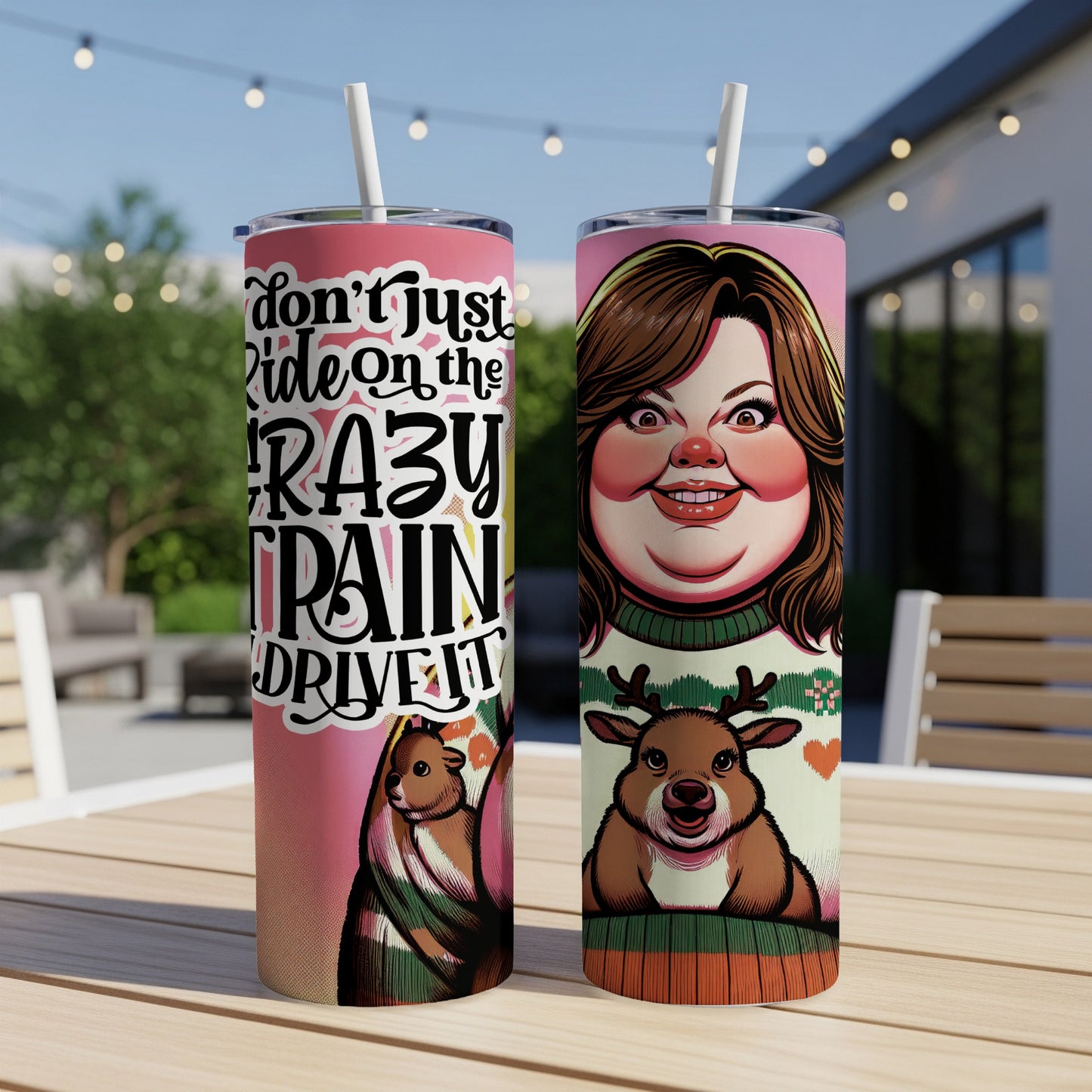 Pink tumbler with text "Don't ride on the crazy train, drive it" and deer graphic.