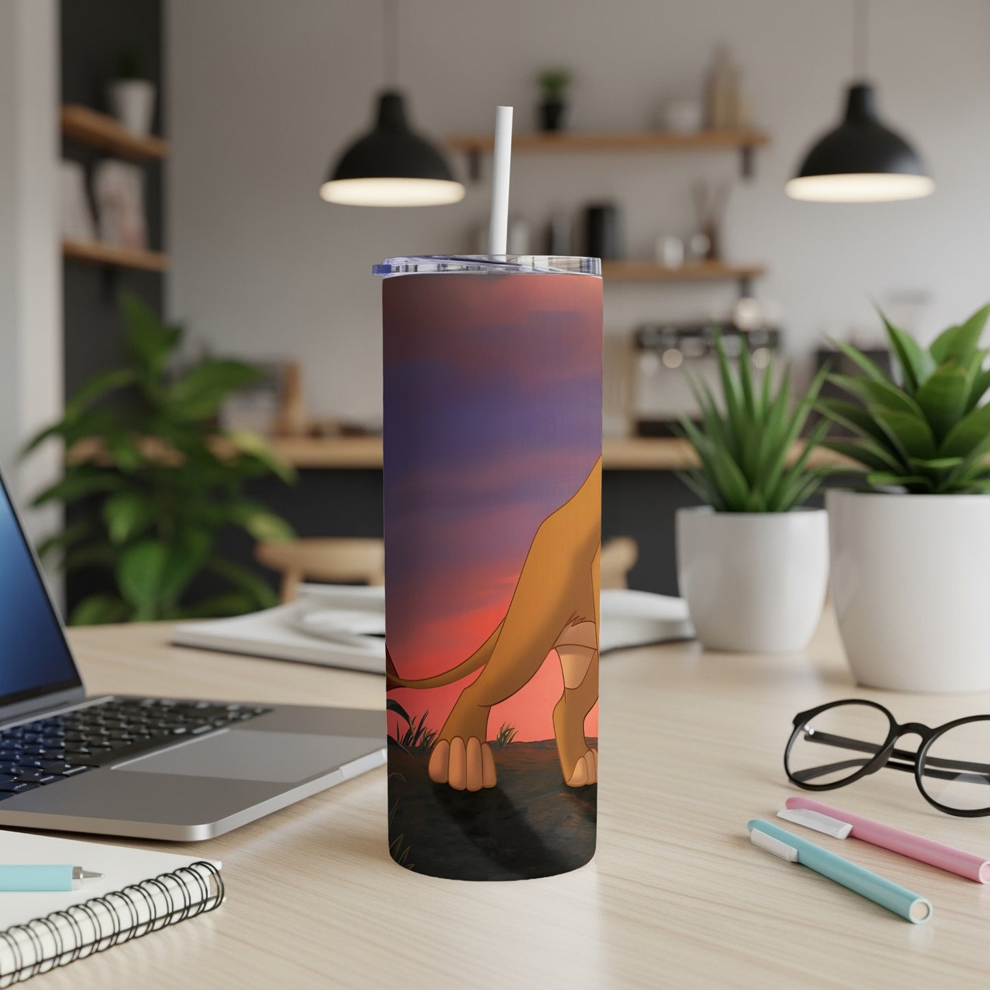 Lion King character Simba on a colorful sunset tumbler.