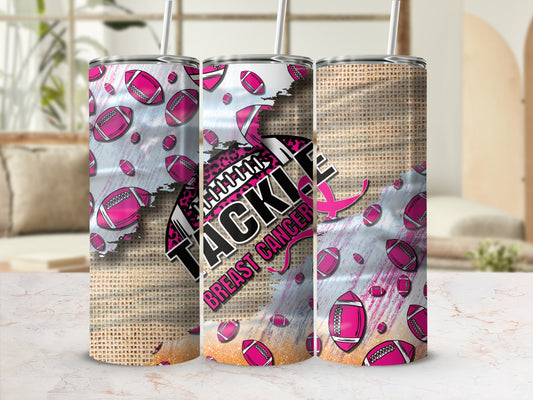 Pink football pattern tumbler with "Tackle Breast Cancer" text.
