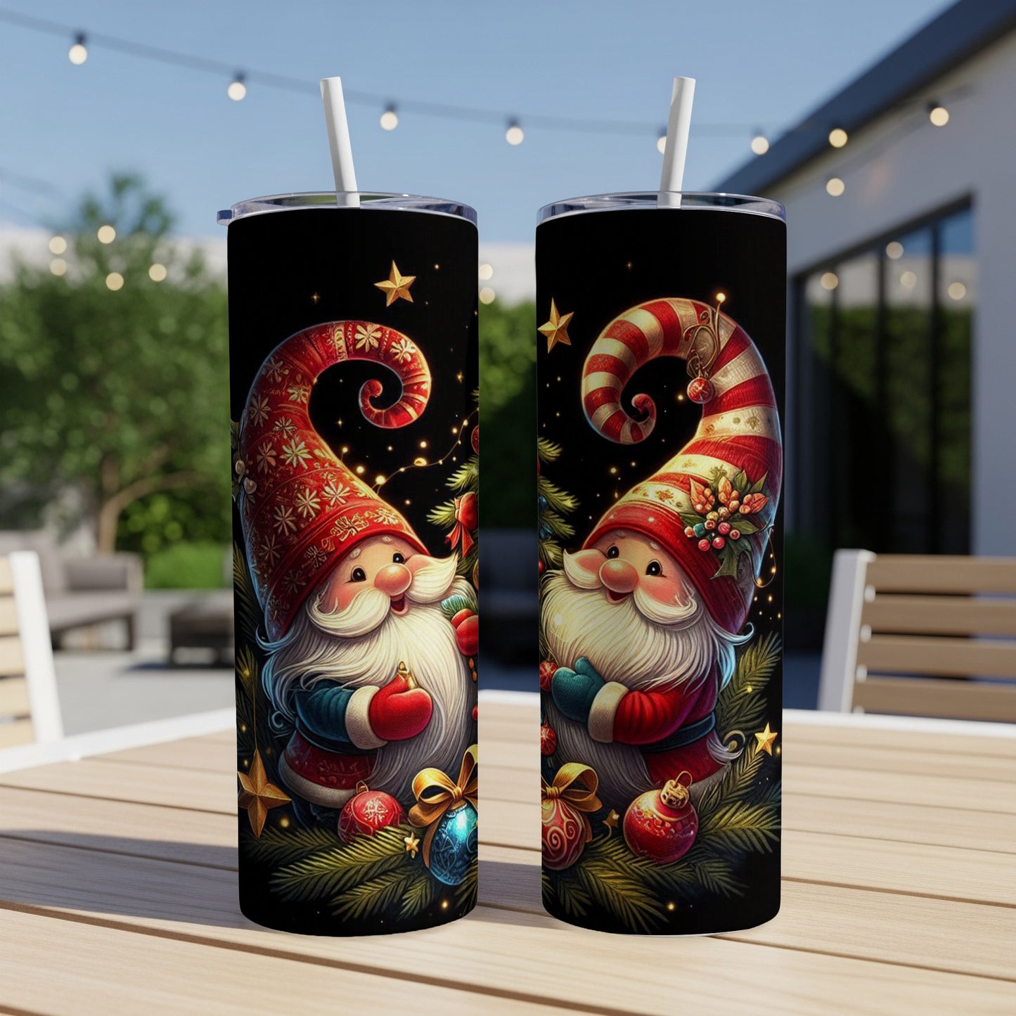 Two Christmas gnomes with starry hats and ornaments on tumblers.