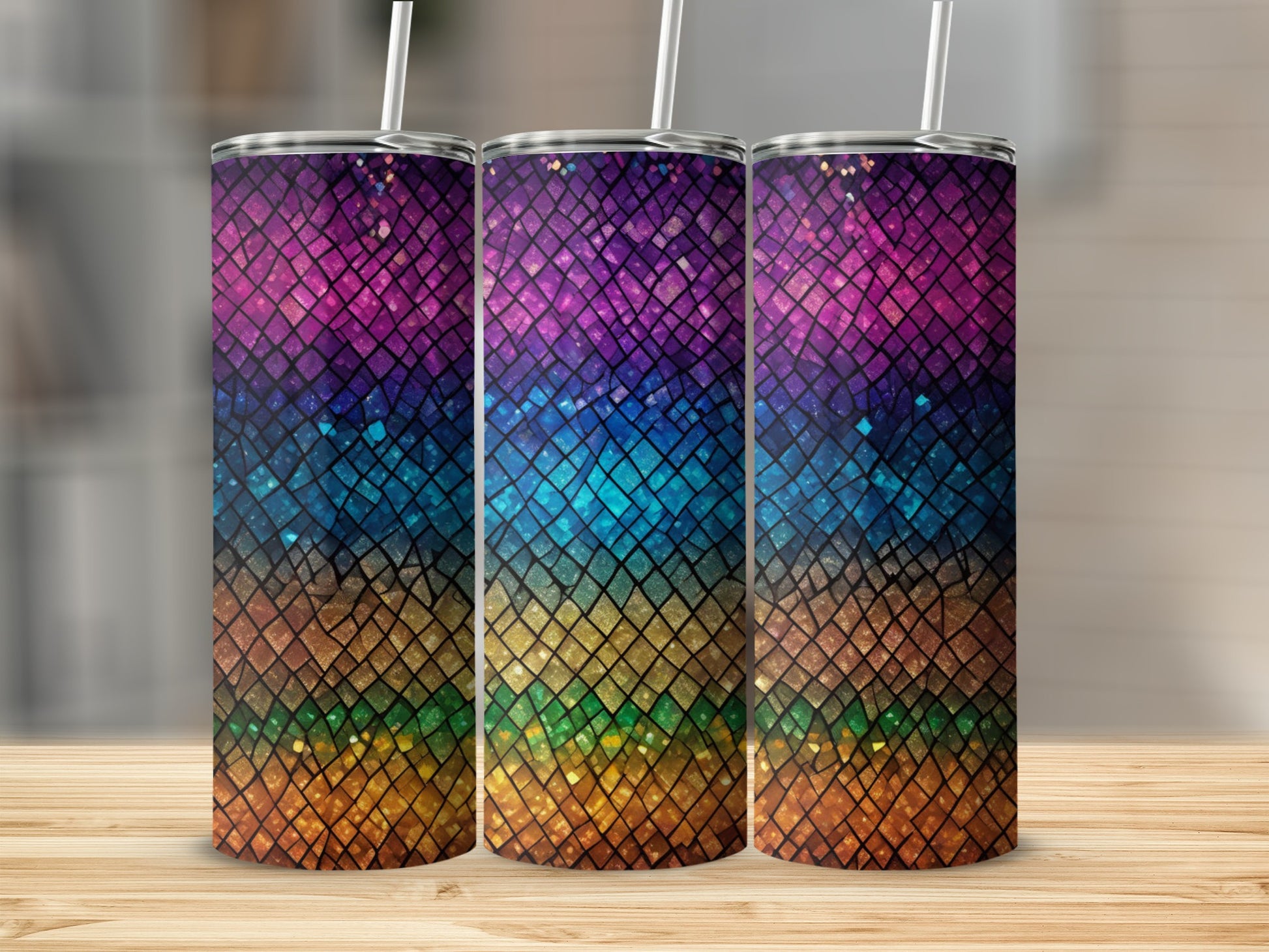 Three tumblers with a colorful, textured geometric pattern.