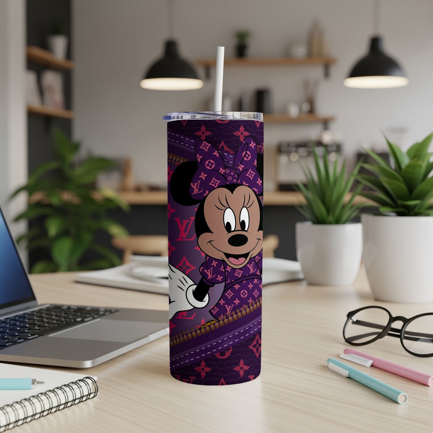 Minnie Mouse on a purple tumbler with Louis Vuitton pattern.