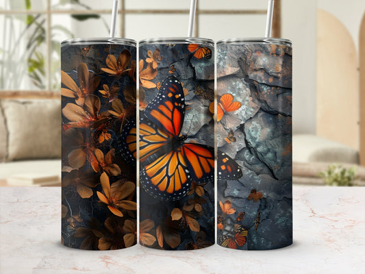 Three tumblers with butterfly and floral designs.