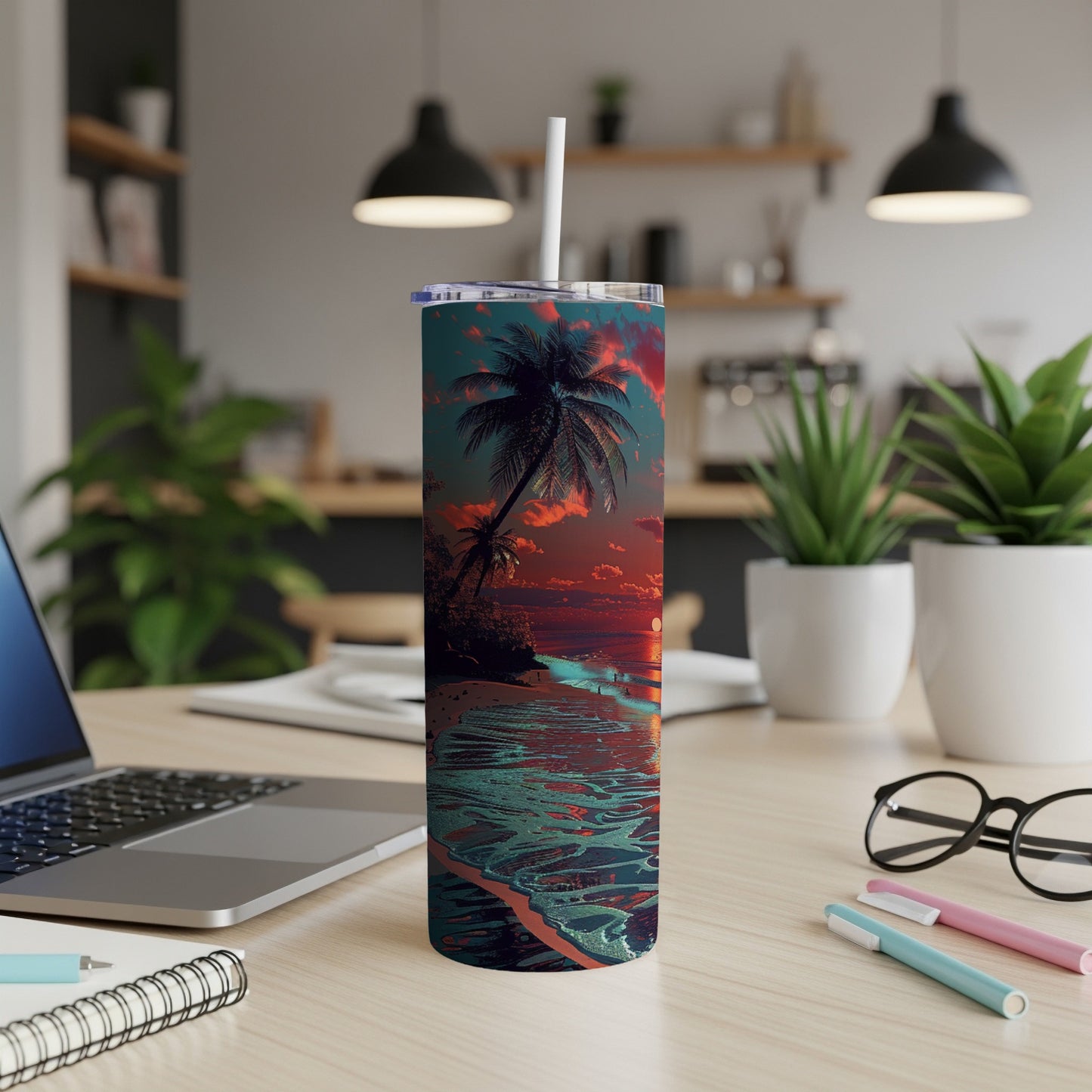 Tropical sunset beach scene on a skinny tumbler with a straw.
