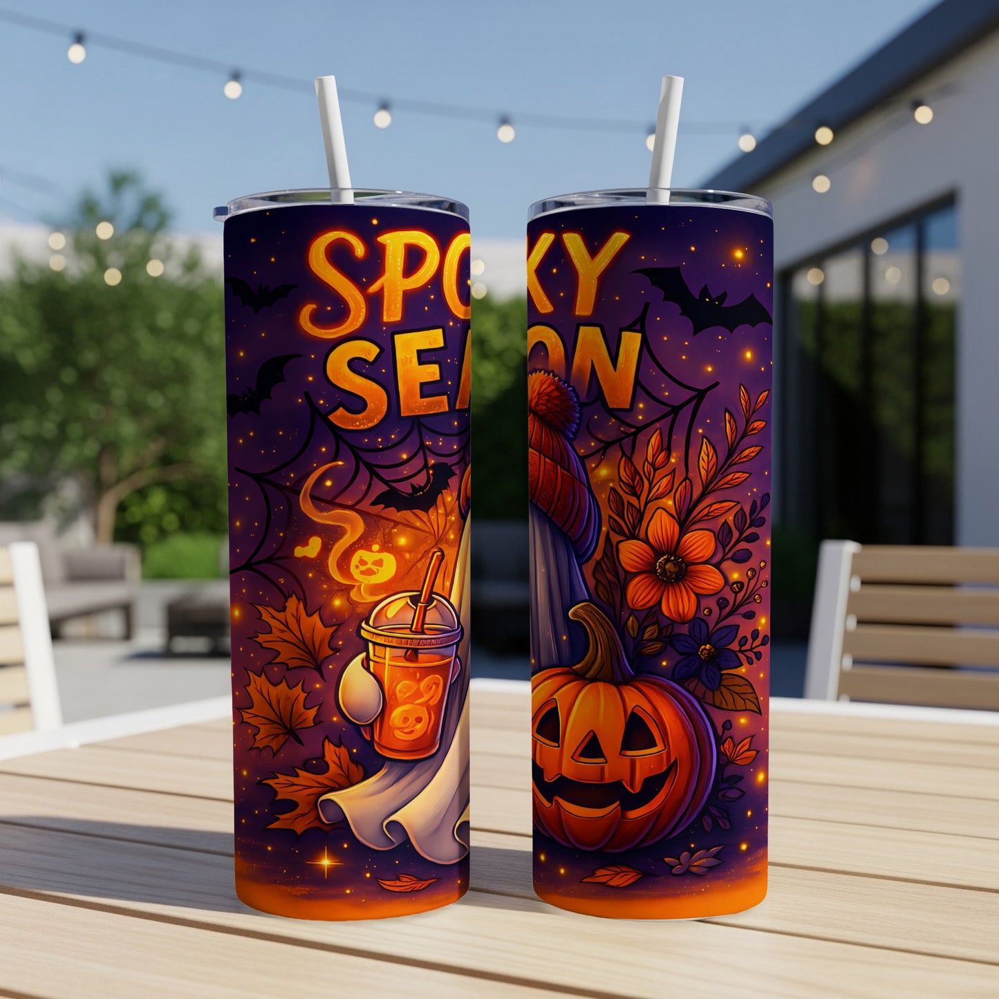 Two tumblers with a "Spooky Season" Halloween design featuring pumpkins, bats, and a ghost.
